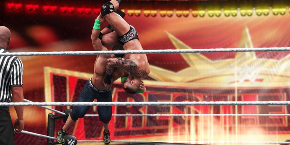 WWE-2K20-John-Cena-AA-Randy-Orton-Through-Flaming-Table-at-Wrestlemania