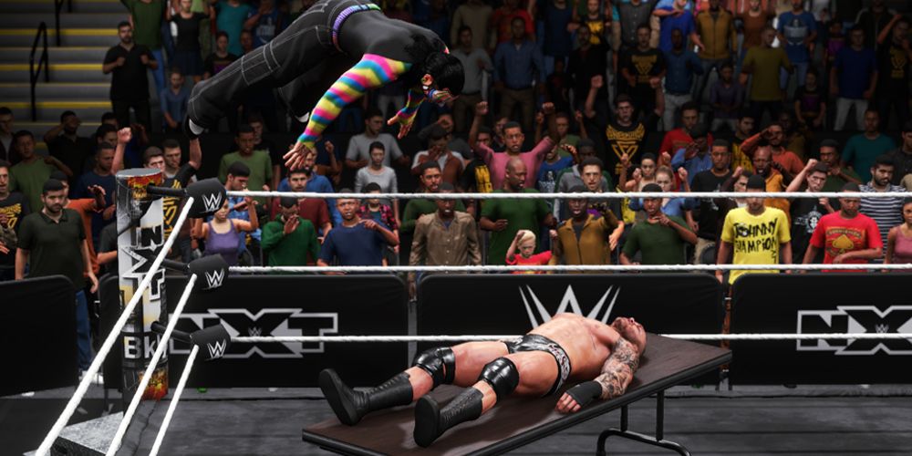 WWE-2K20-Swanton-Bomb-On-Table