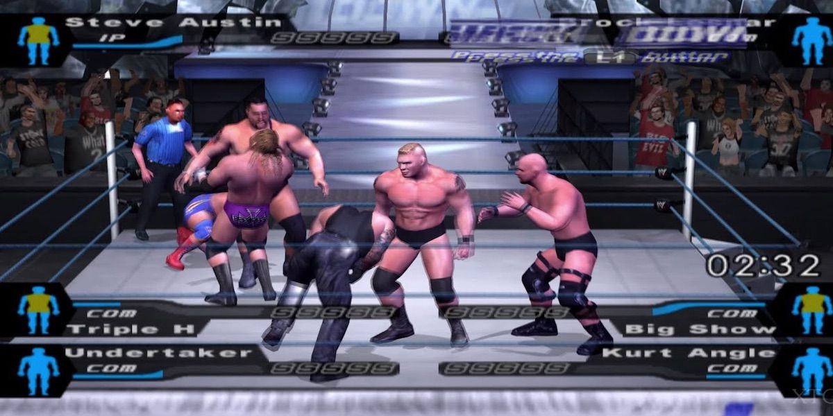 6 wrestlers and a referee fighting in a ring