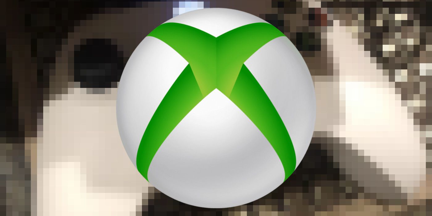 The rumored white controller for Xbox Series X sits atop a keyboard with the Xbox Logo in the foreground.