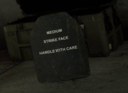 armor plate sitting outside vest