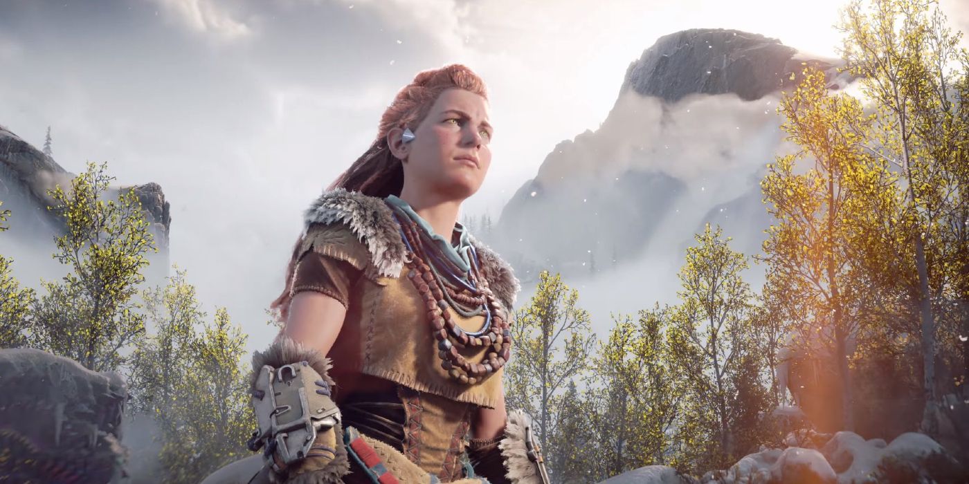 aloy stands in front of mountain