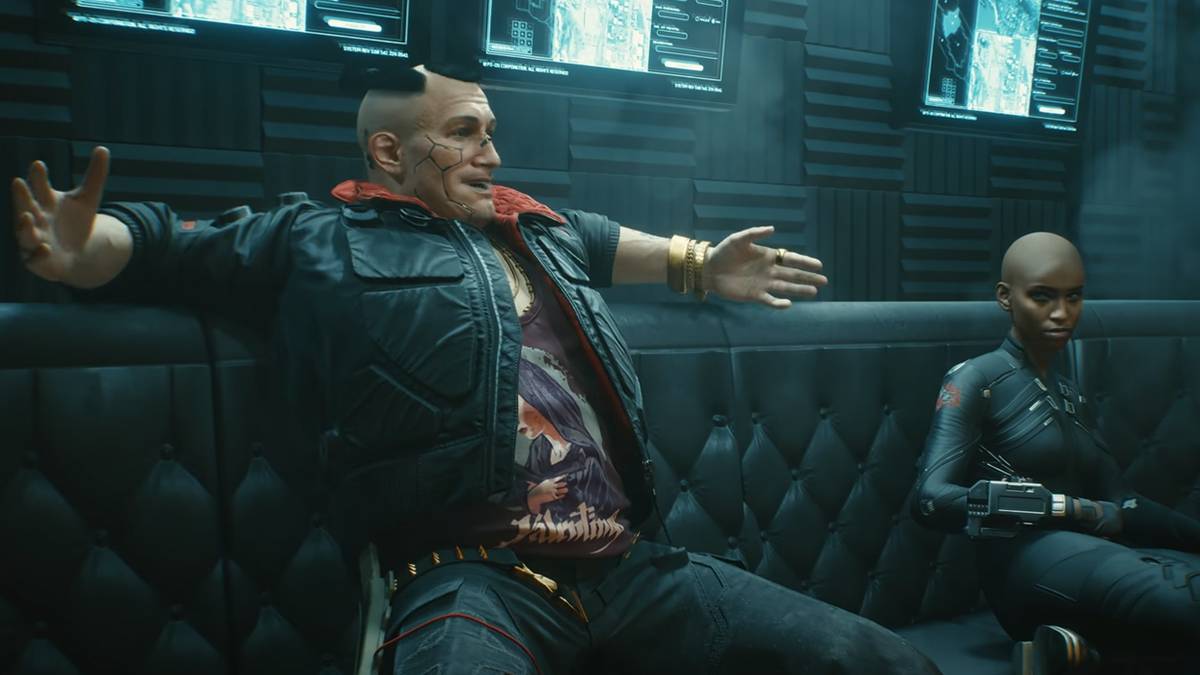 Jackie Welles sitting on a couch