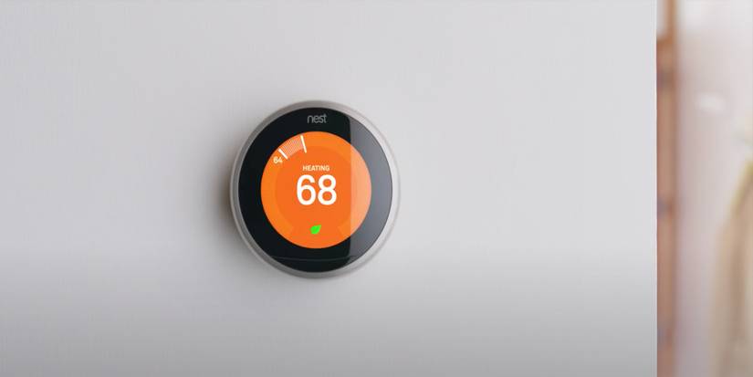 Steel Nest Thermostat on grey wall
