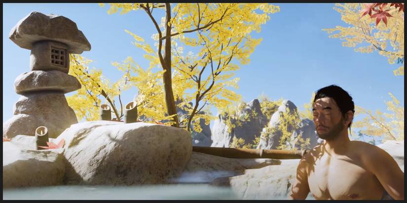 Jin relaxes in one of the hotsprings in Ghost of Tsushima.
