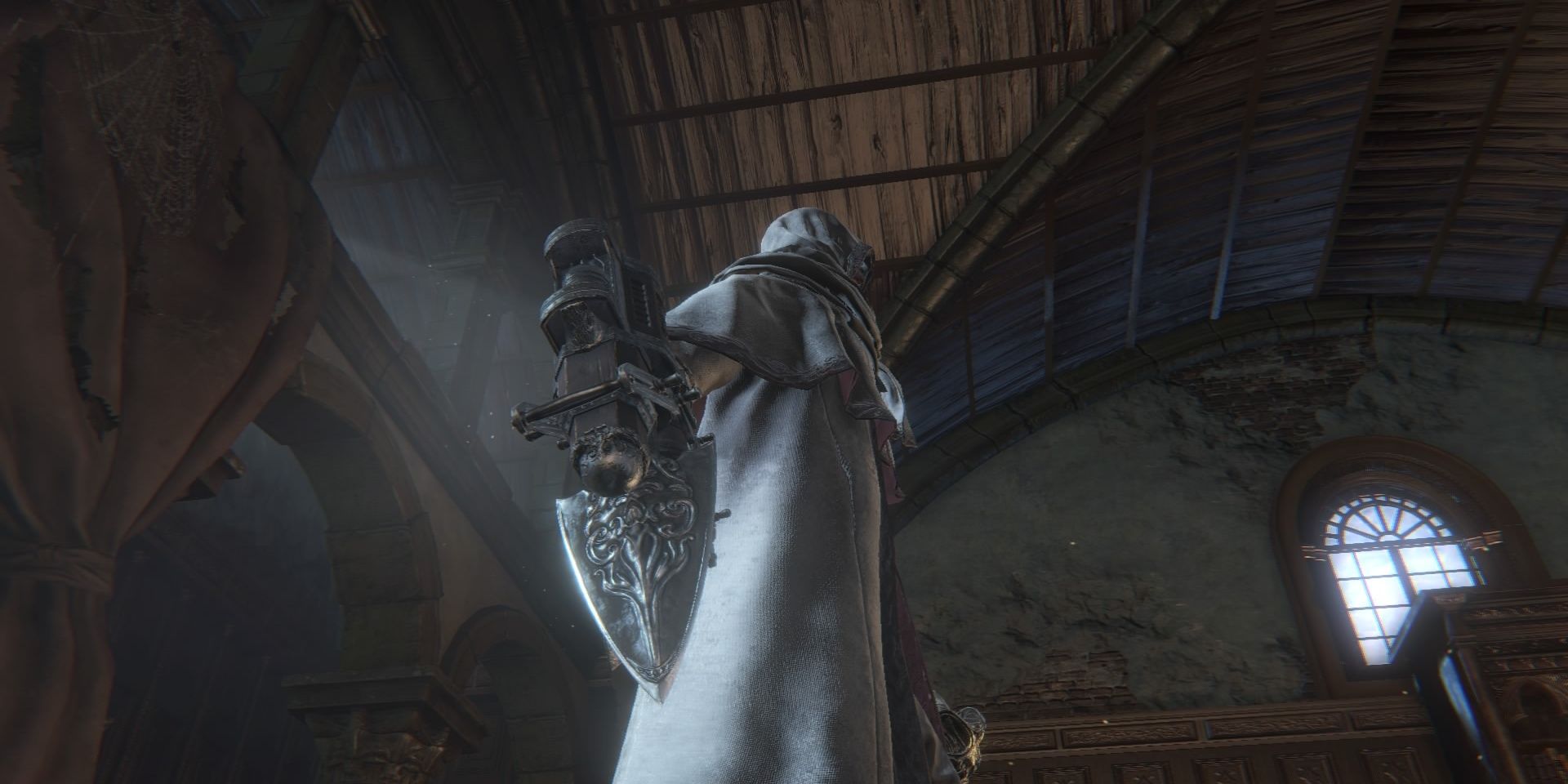 Hunter holding Stake Driver in Bloodborne
