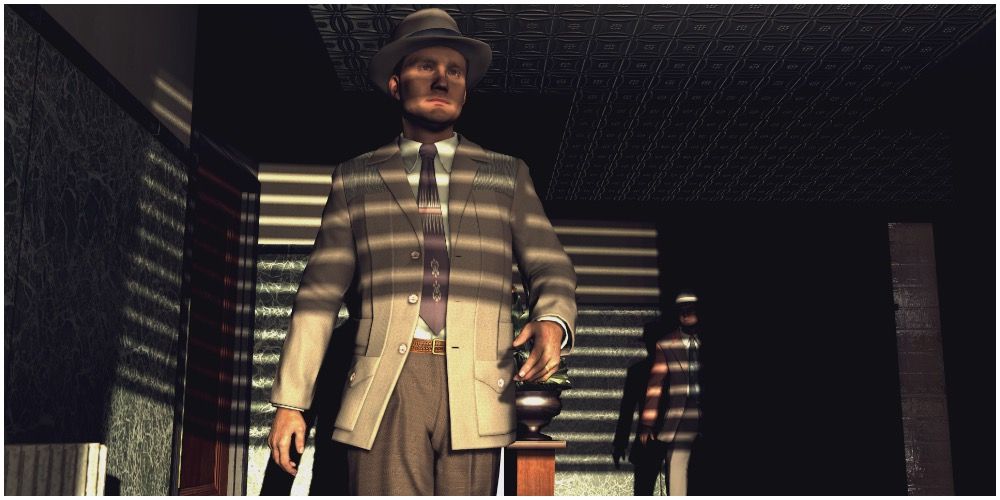 Cole Phelps walking in a dark room