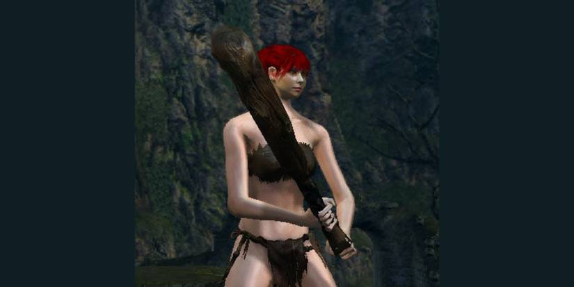 player of the deprived class holding a wooden club with two hands