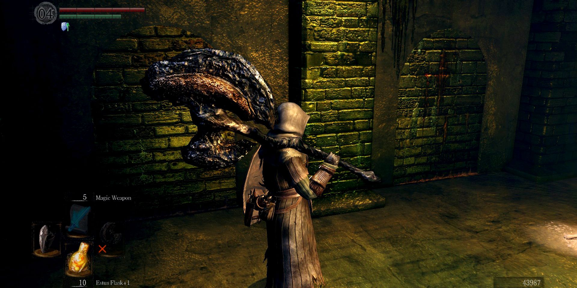 player wielding a huge black greataxe while underground in dark souls