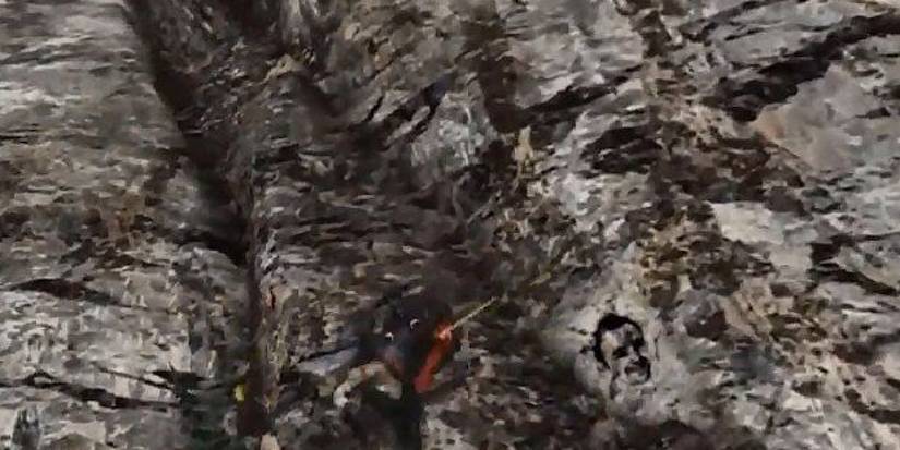 Jesse Pinkman etched in to the side of a cliff face