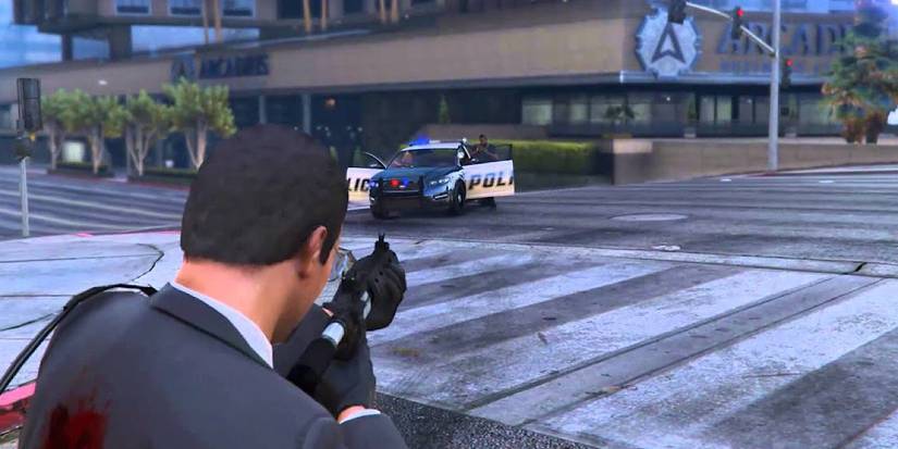 Michael in combat in a suit. A reference to Heat