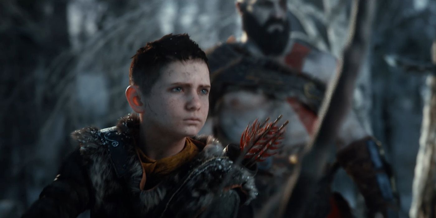 An image of Atreus with Kratos in the background.
