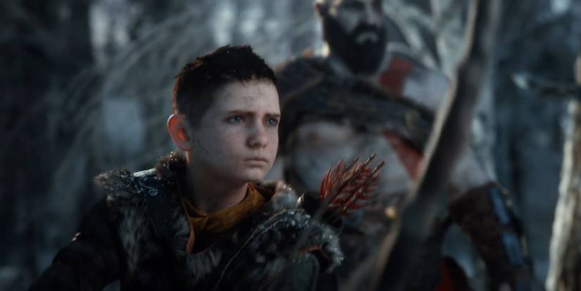 An image of Atreus with Kratos in the background.