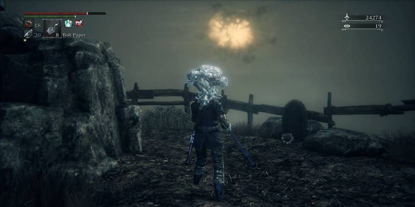 the player facing the moon over fishing hamlet.