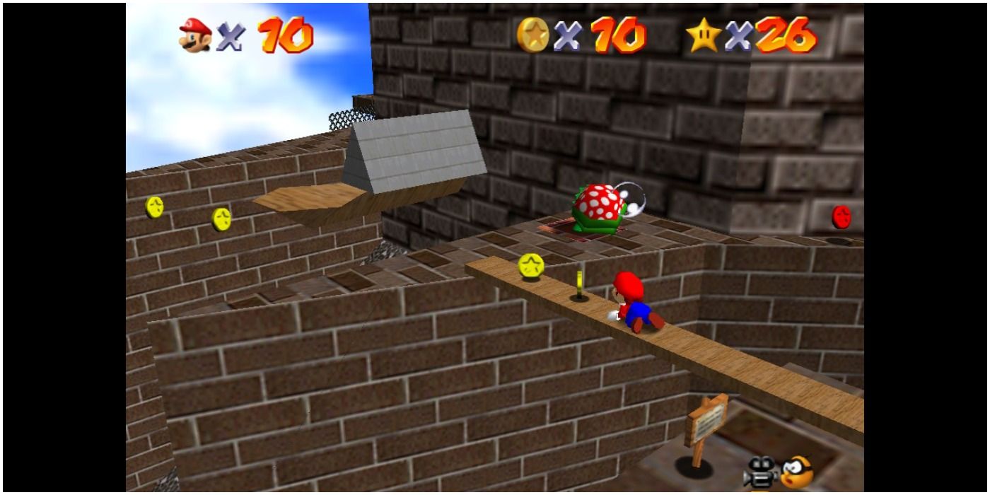 Mario crawling on a plank in Whomp's Fortress.