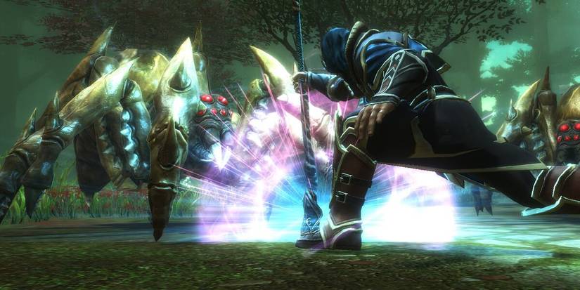 The Fateless One fending off a spider enemy.