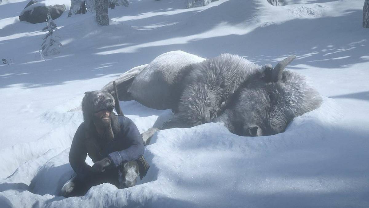 Arthur Morgan next to the dead legendary White Bison