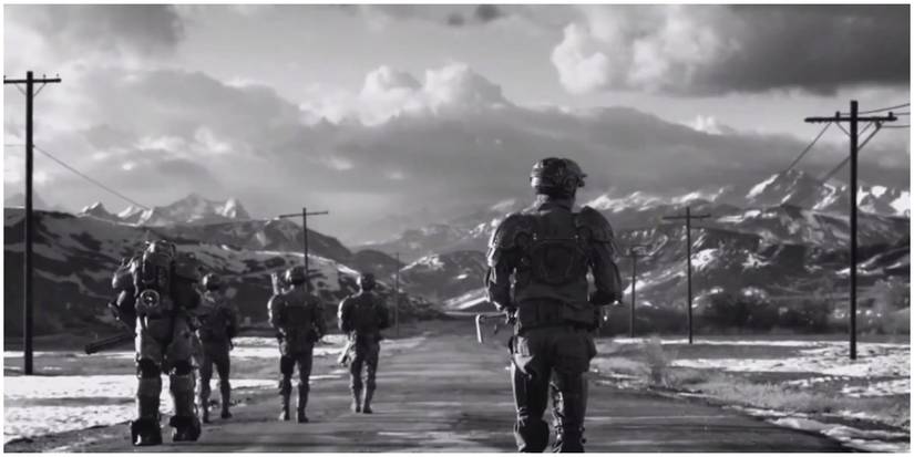 The Sole Survivor as they walk down a road in Alaska