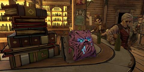 The nibblenomicon sitting on the counter at Moxie's bar