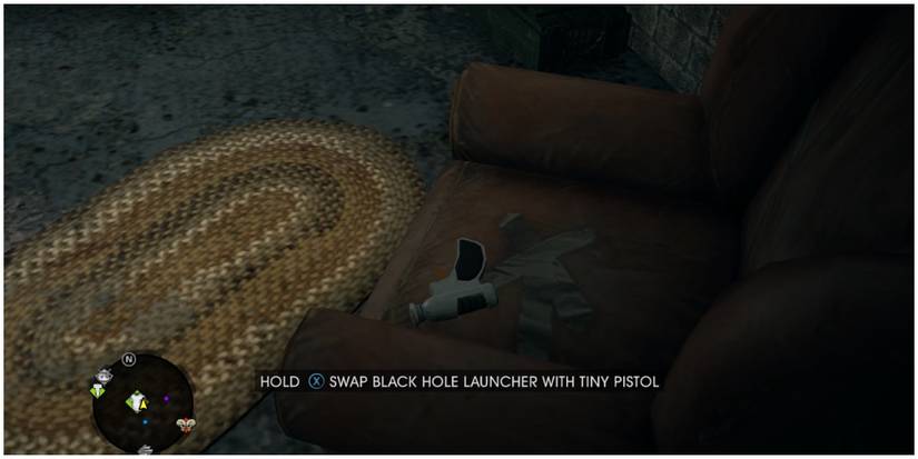 The tiny pistol being found on a couch