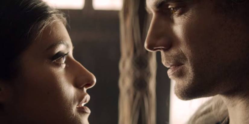 Yennefer and Geralt facing each other.