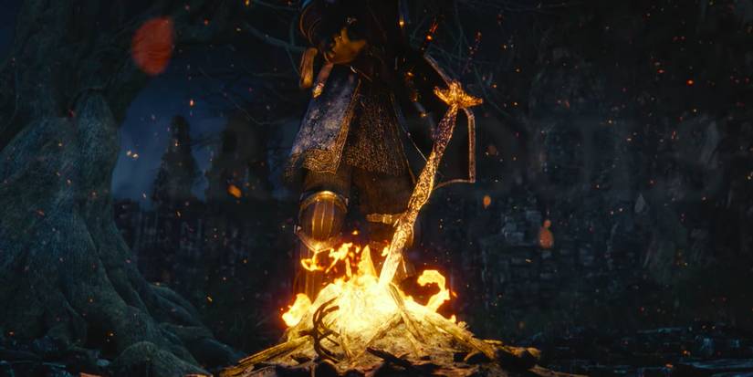 Hero standing close to bonfire.