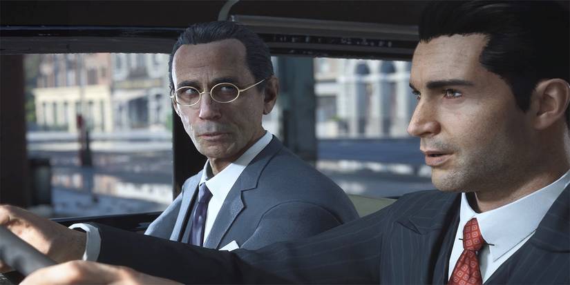 Tommy sitting in a car with Frank