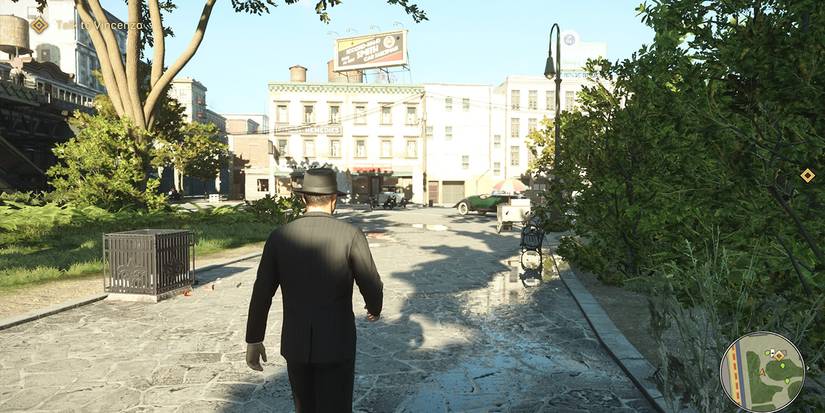 Tommy walking through a park