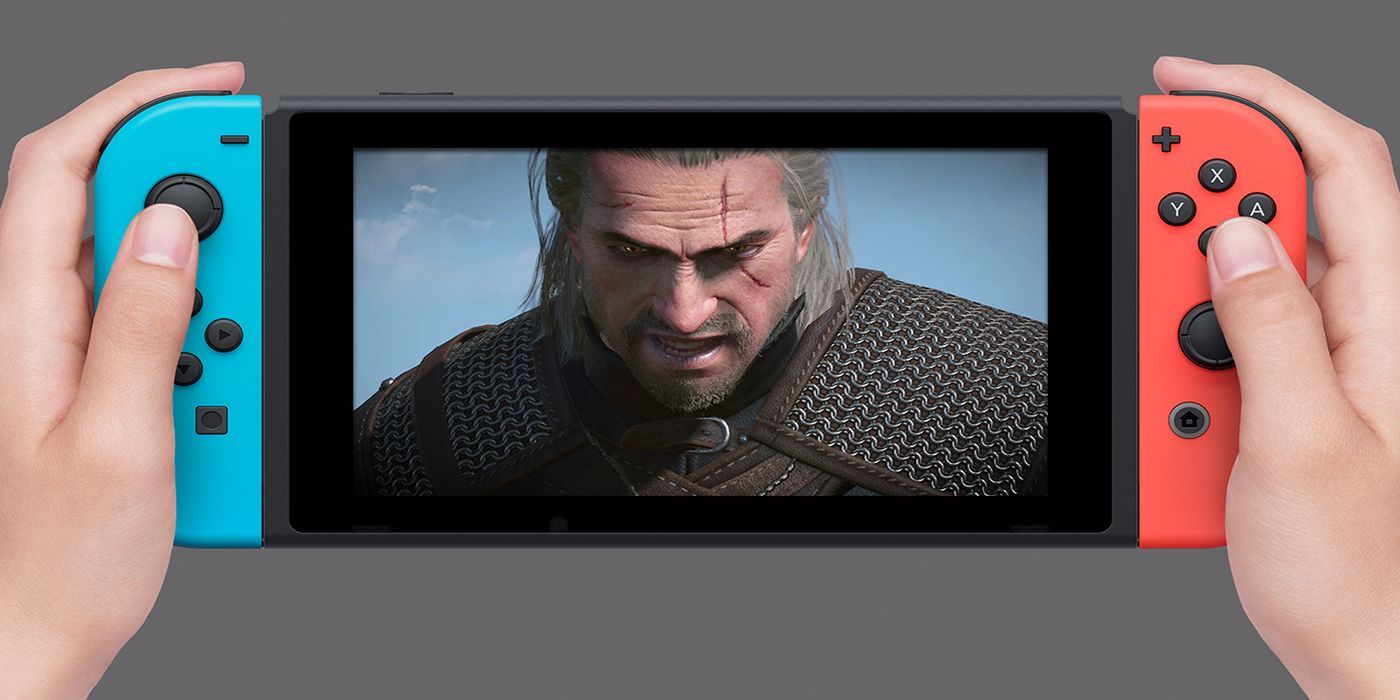 hands holding switch playing witcher