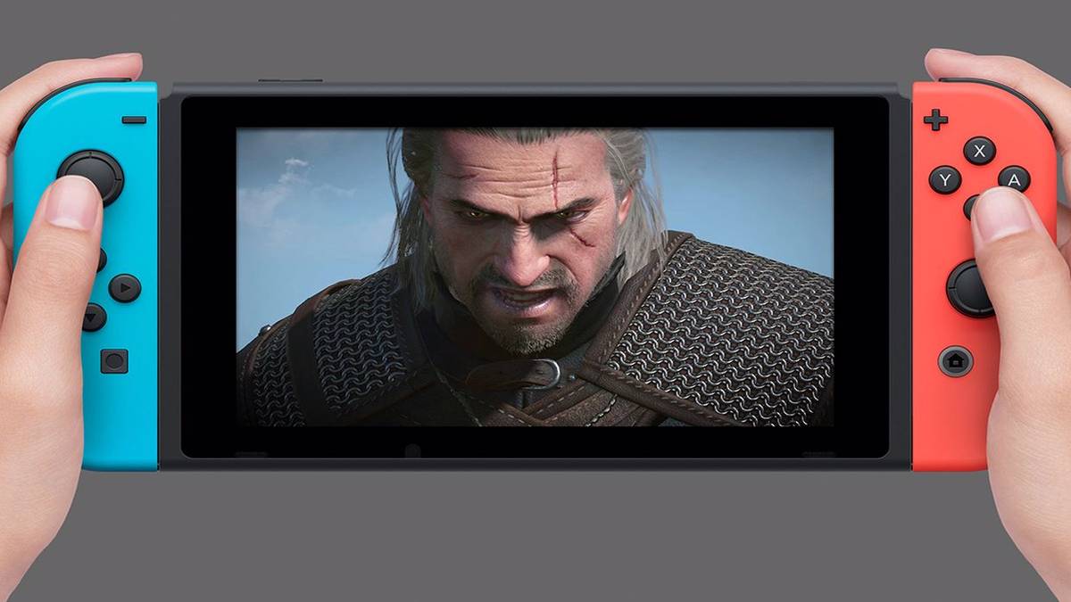hands holding switch playing witcher