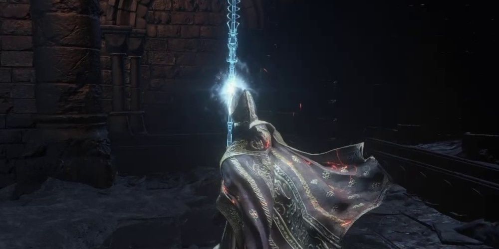 Character holding up the Archdeacon's Great Staff Dark Souls 3