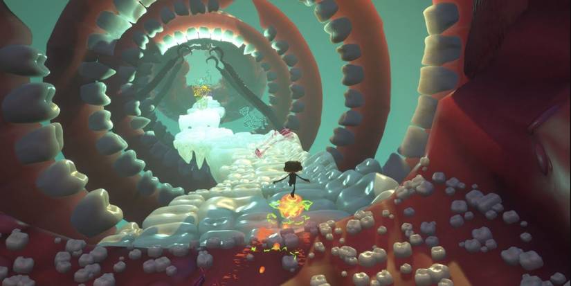 Psychonauts 2 Raz using Levitation to traverse on teeth