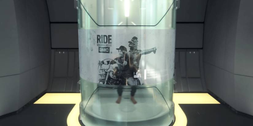 sam in bathroom with ride poster