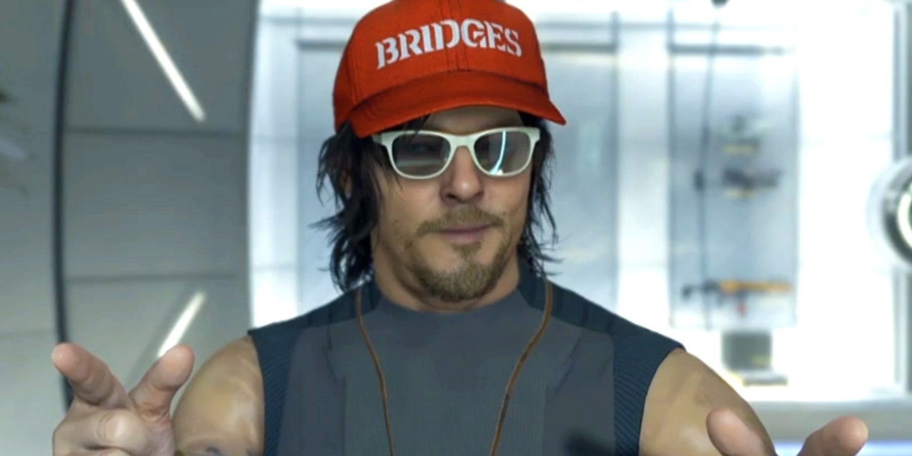 sam in death stranding with red hat and glasses