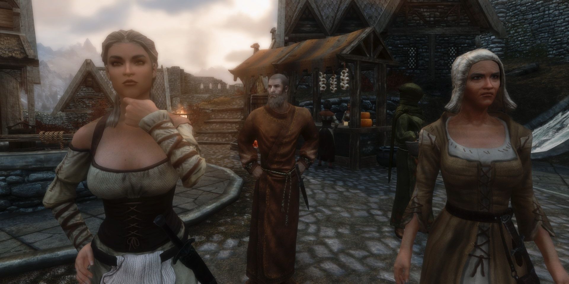 Three citizens of Skyrim staring at the player