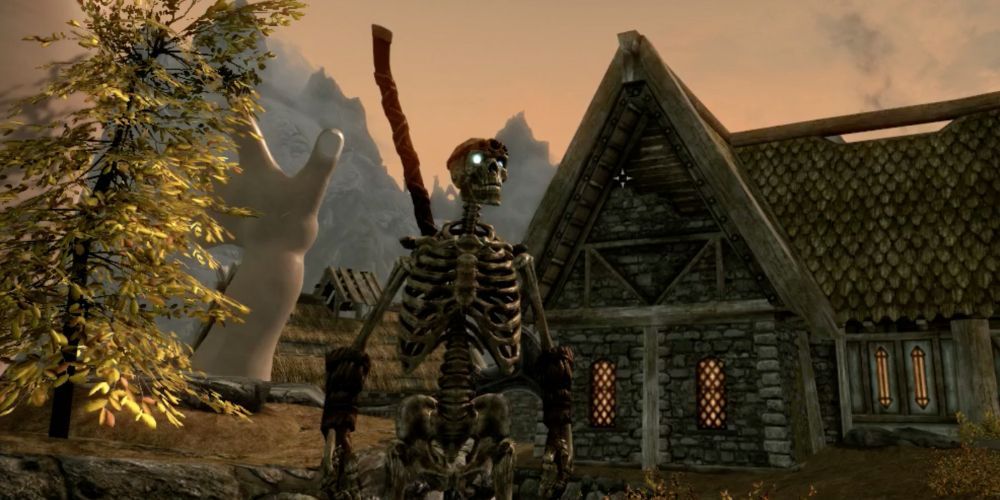 A skeleton outside a house in Skyrim