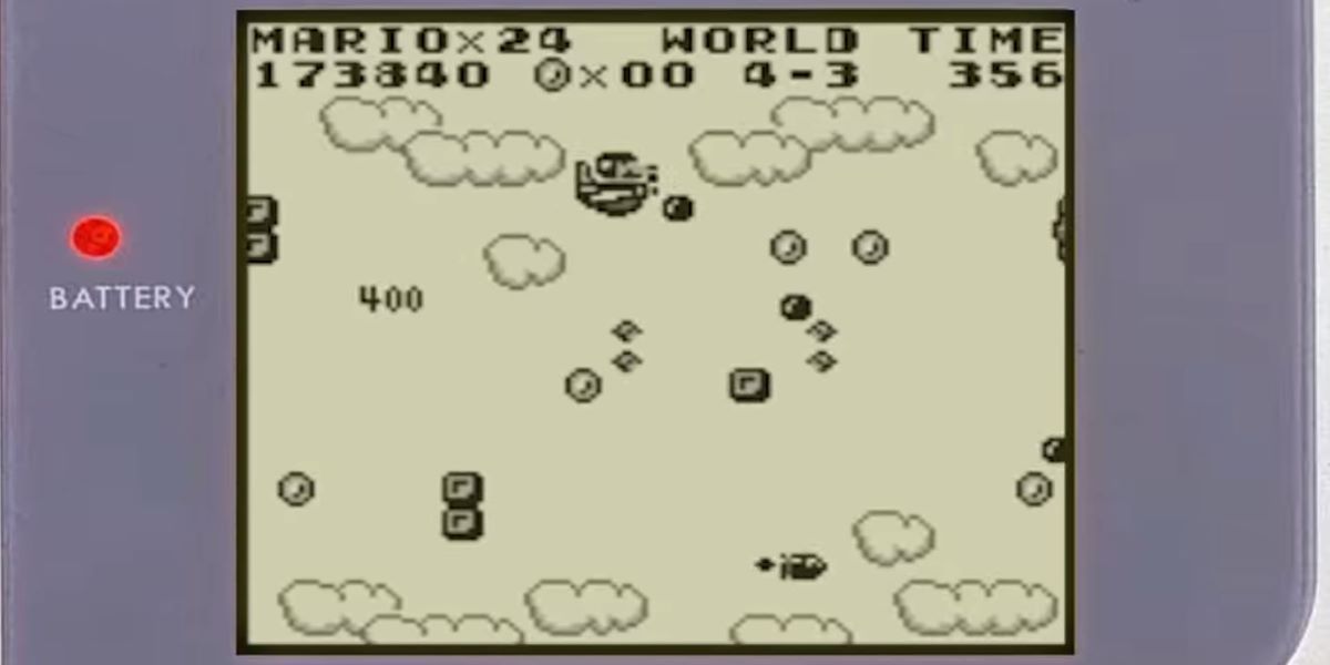 Mario flying ship firing in the clouds in Super Mario Land Game Boy