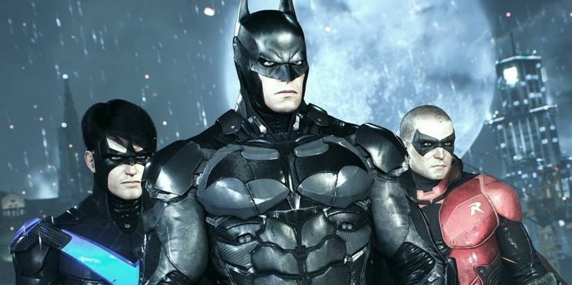 batman nightwing and robin with the moon in the background