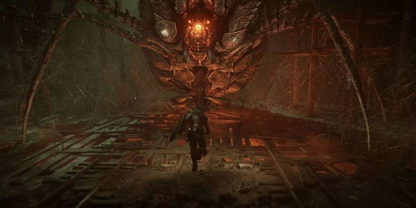 Demon's Souls player fighting the armor spider boss