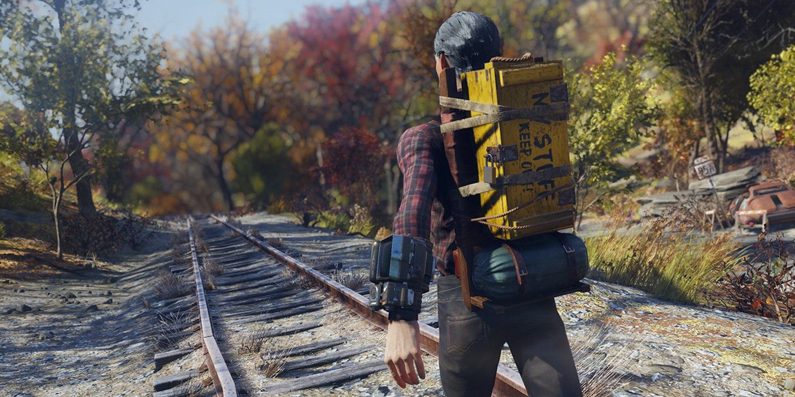 Fallout 76 Older Man Wearing Backpack Walking on Train Tracks in the Forest