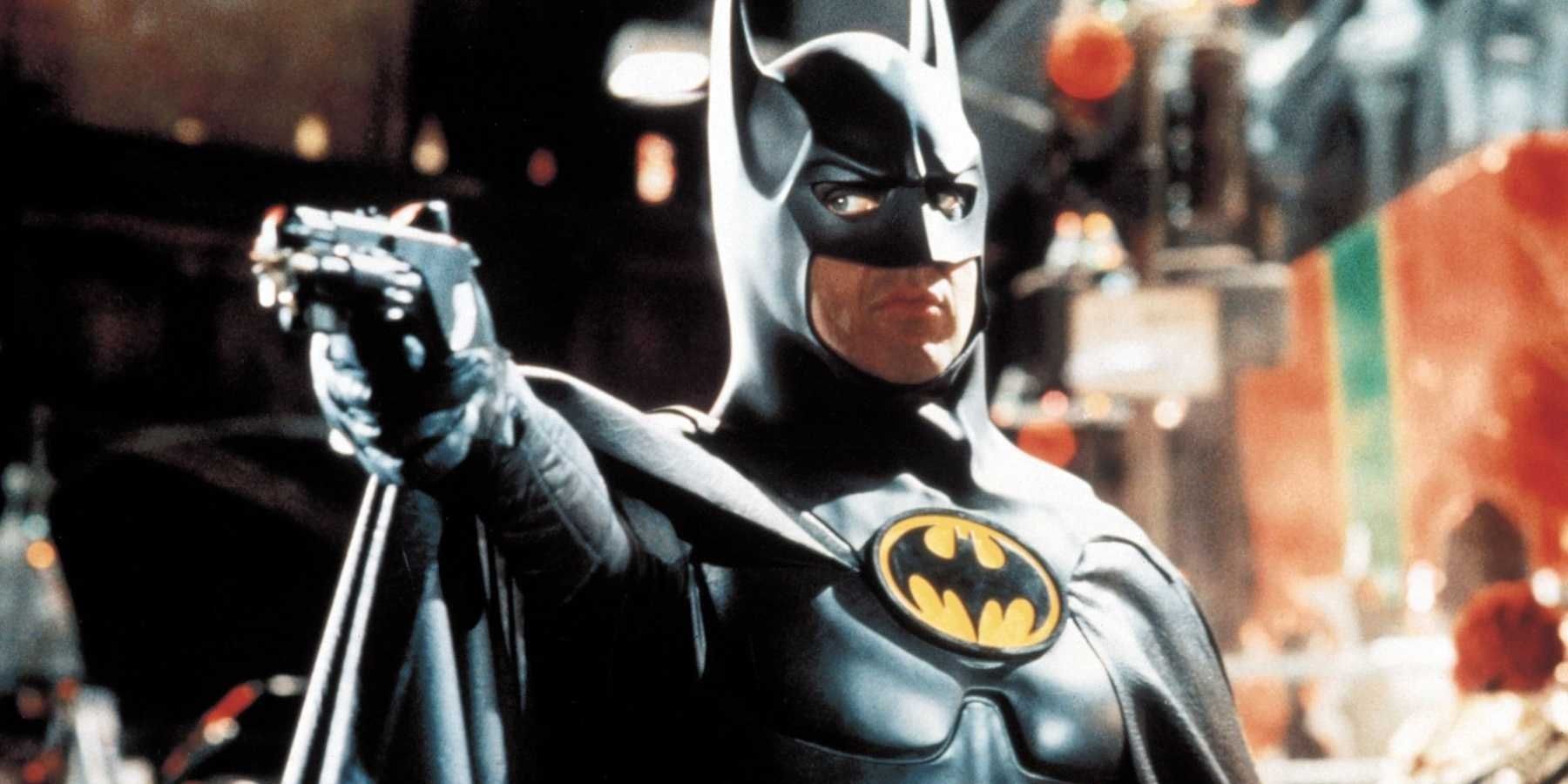 Michael Keaton's Batman aiming his grapple gun in Batman Returns