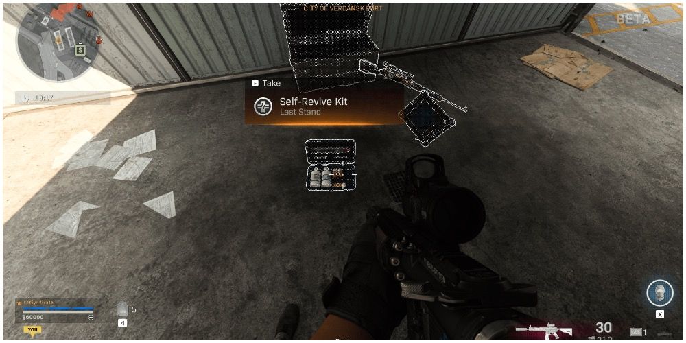 A player finding a Self-Revive Kit in a chest