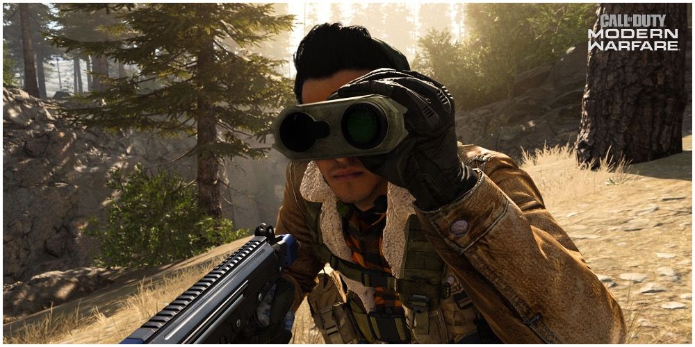 An operator using a spotter scope