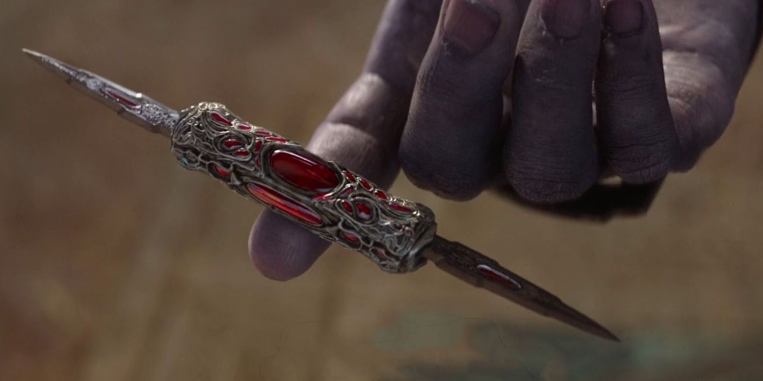 Thanos balancing Gamora's knife