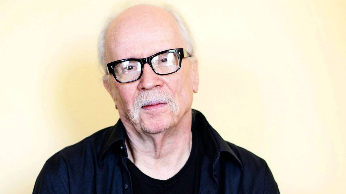 john carpenter photo yellow background