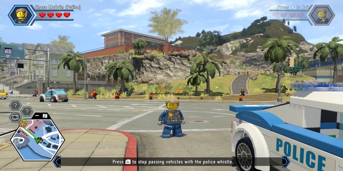 Imagem típica do jogo Lego City Undercover: o personagem principal na frente da estrada