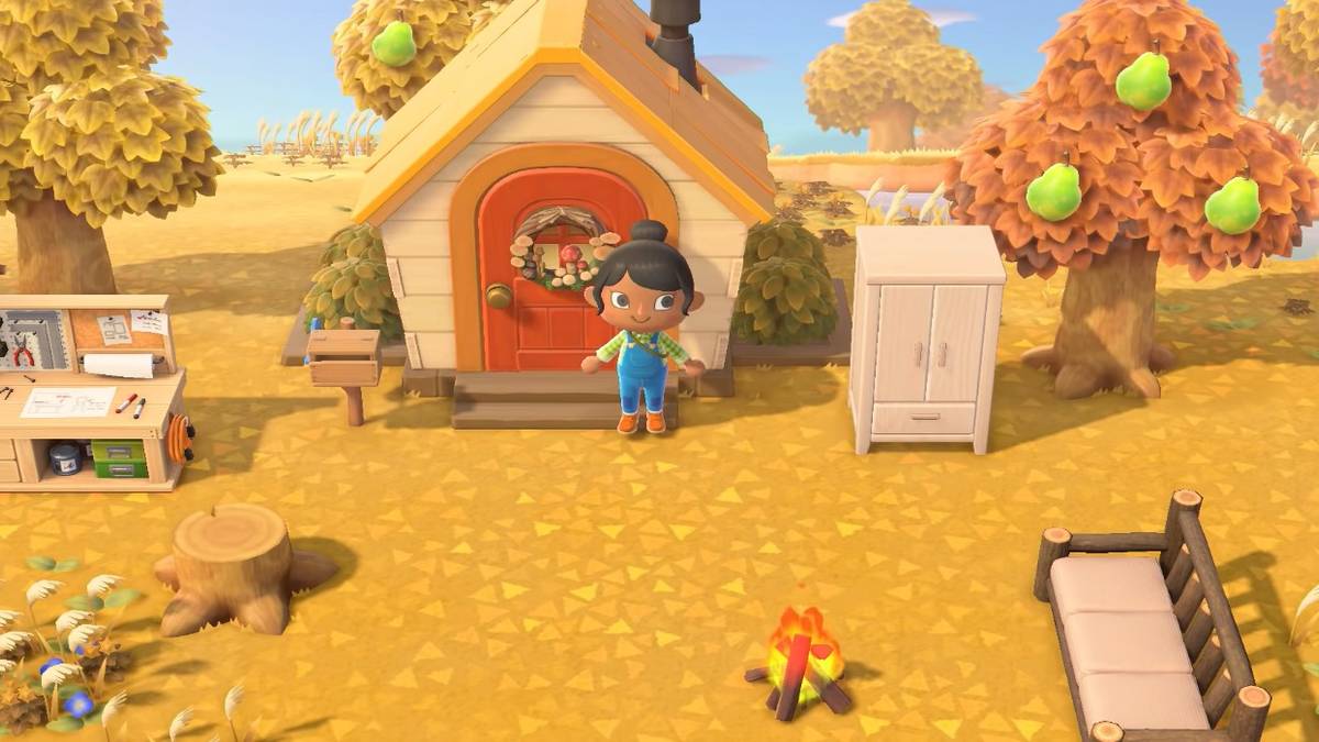 new horizons player standing in front of fall house