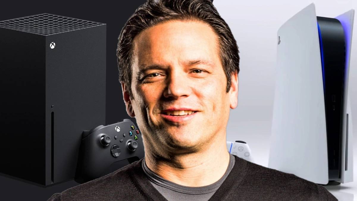 phil spencer in front of ps5 and xbox series x