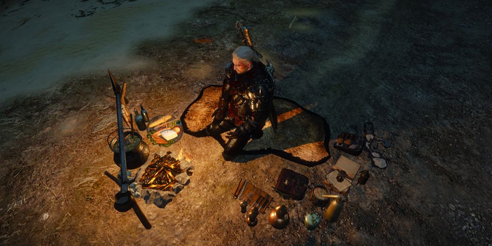 Geralt sitting next to a camp fire (The Witcher 3)