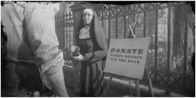 Arthur as he talks to a nun in front of a church